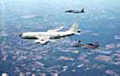 KC-135R Stratotanker refuels two F-15E Strike Eagles from 4th Fighter Wing